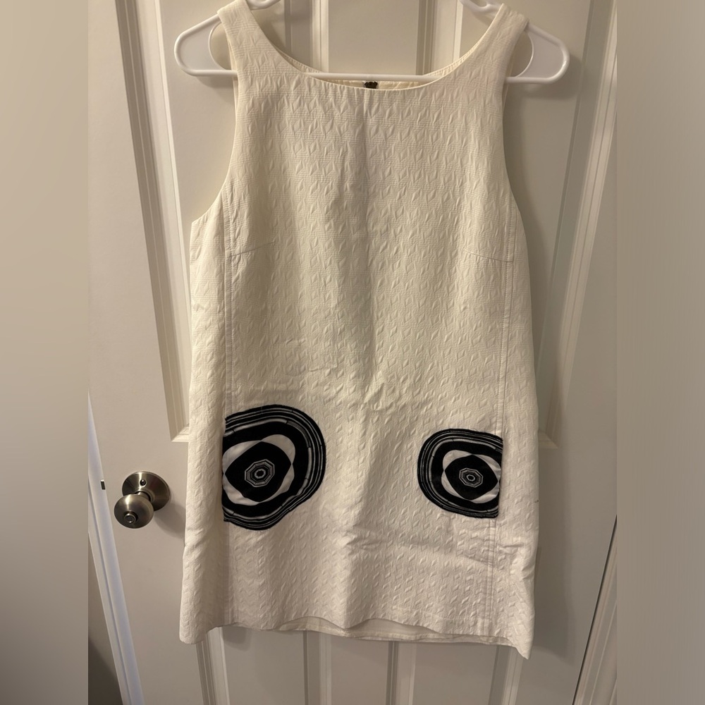 Elegant White Sleeveless Dress with Black Accents